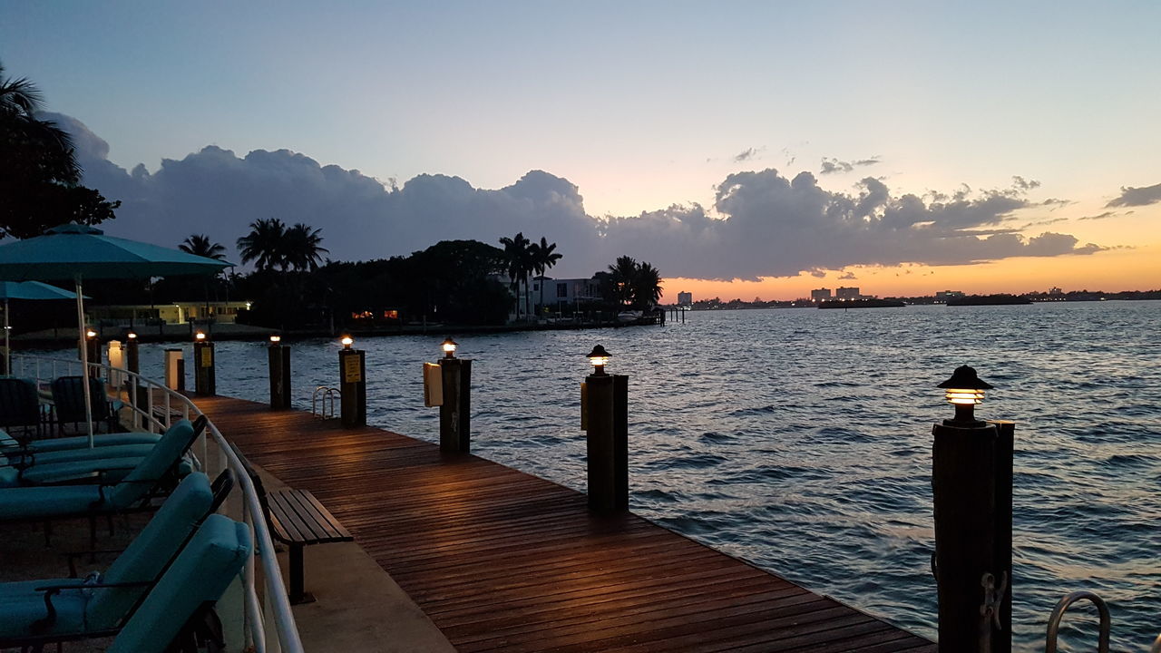 sunset, water, pier, outdoors, bench, travel destinations, silhouette, sea, beauty in nature, no people, nature, sky, day