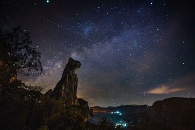 Scenic view of star field against sky at night