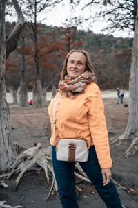 Portrait of a smiling young woman in winter