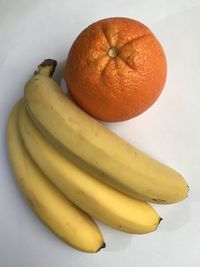 High angle view of orange slices on white background