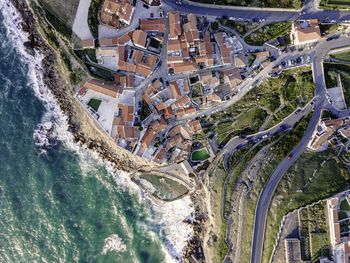 High angle view of road amidst buildings in city