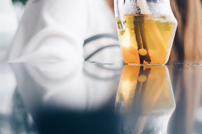 Close-up of beer glass on table