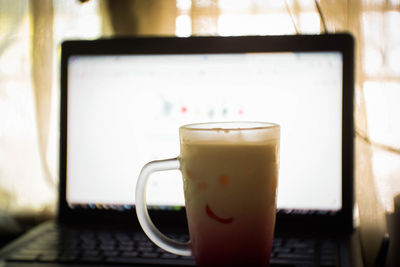 Close-up of drink served on table