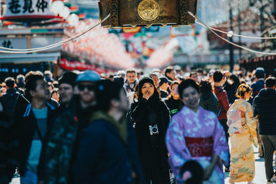 People on street in city