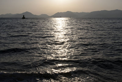 Scenic view of sea against sky during sunset