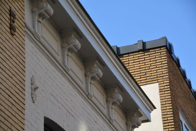 Low angle view of historic buildings against clear sky