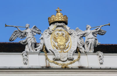 Architectural artistic decorations on hofburg palace, vienna, austria