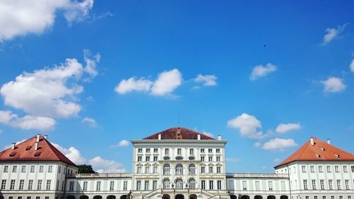 Low angle view of building against blue sky