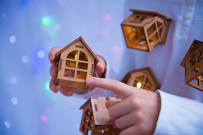 Close-up of hand holding toy toys