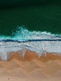 Aerial view of waves at beach