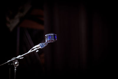 Close-up of microphone on stage