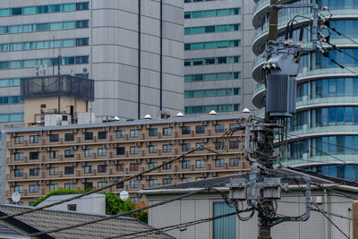 Low angle view of modern buildings in city