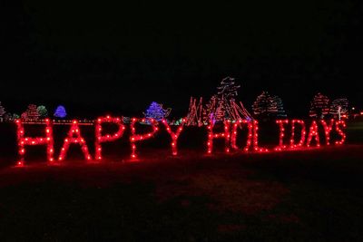 Illuminated text at night