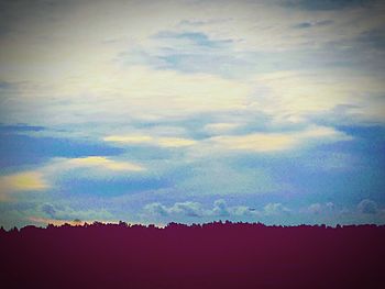 Scenic view of silhouette landscape against sky
