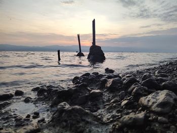 Scenic view of sea against sky during sunset