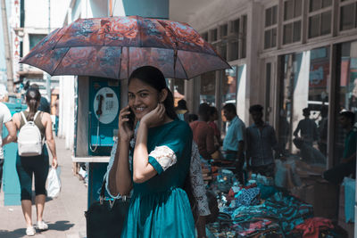 Portrait of people on city street