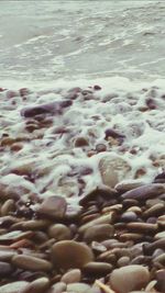 Waves on shore at beach