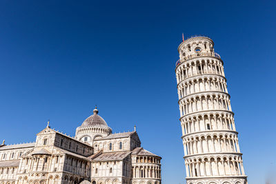 Low angle view of building against blue sky