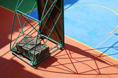 Shadows of a basketball hoop