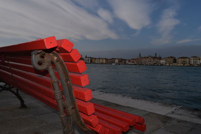 Red boat moored at the waterfront