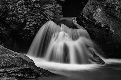 Scenic view of waterfall in forest