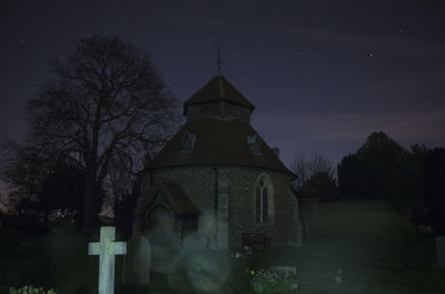 Cathedral against sky at night