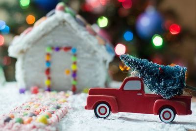 Close-up of toy on christmas tree during winter