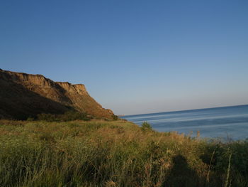 Scenic view of sea against clear sky