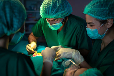Doctors are using tools to perform patient procedures in the operating room. medical concept. 