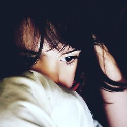 Close-up portrait of a serious young woman