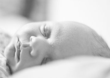 Close-up of young woman with eyes closed