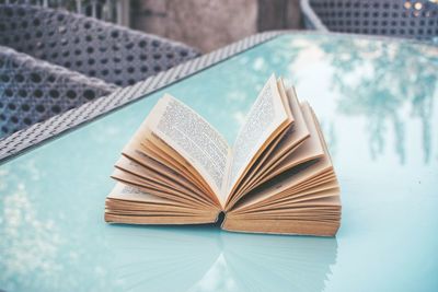 High angle view of book on table