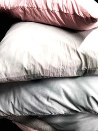 Close-up of multi colored pillow stack