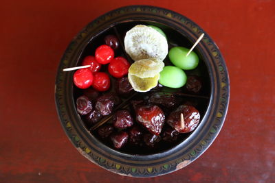 Close-up of fruits in plate on table