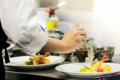 Man preparing food in restaurant