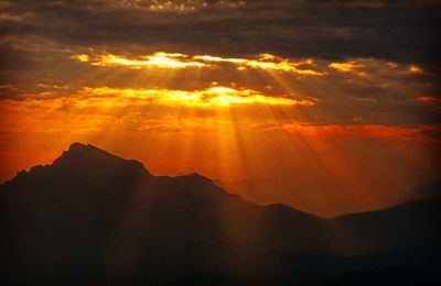 Scenic view of dramatic sky during sunset