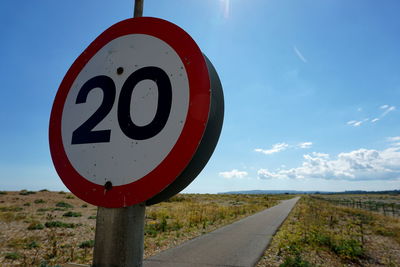 Warning sign on road