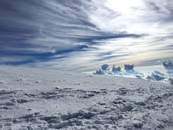 Scenic view of landscape against cloudy sky