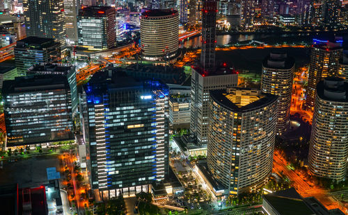 High angle view of illuminated cityscape at night