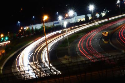 High angle view of light trails on street at night