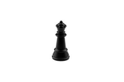 Close-up of chess pieces against white background