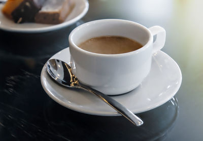 High angle view of coffee cup on table