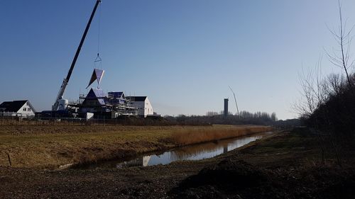 Traditional windmill against clear sky