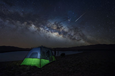 Tent against sky at night