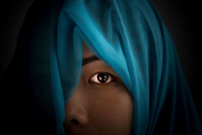 Close-up of woman wearing scarf