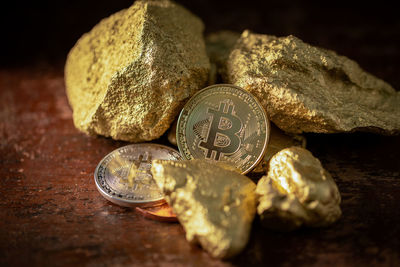 Close-up of coins on table