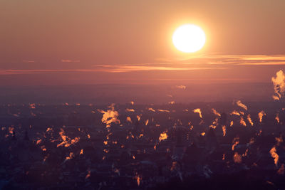 High angle view of cityscape against sky during sunset