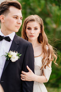 Young couple standing outdoors