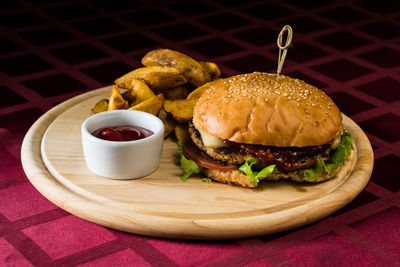 Close-up of burger on table