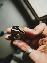 Close-up of hand holding eyeglasses